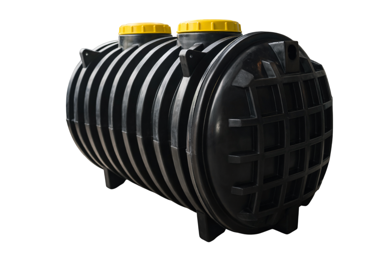 Black ribbed septic tank with two yellow caps